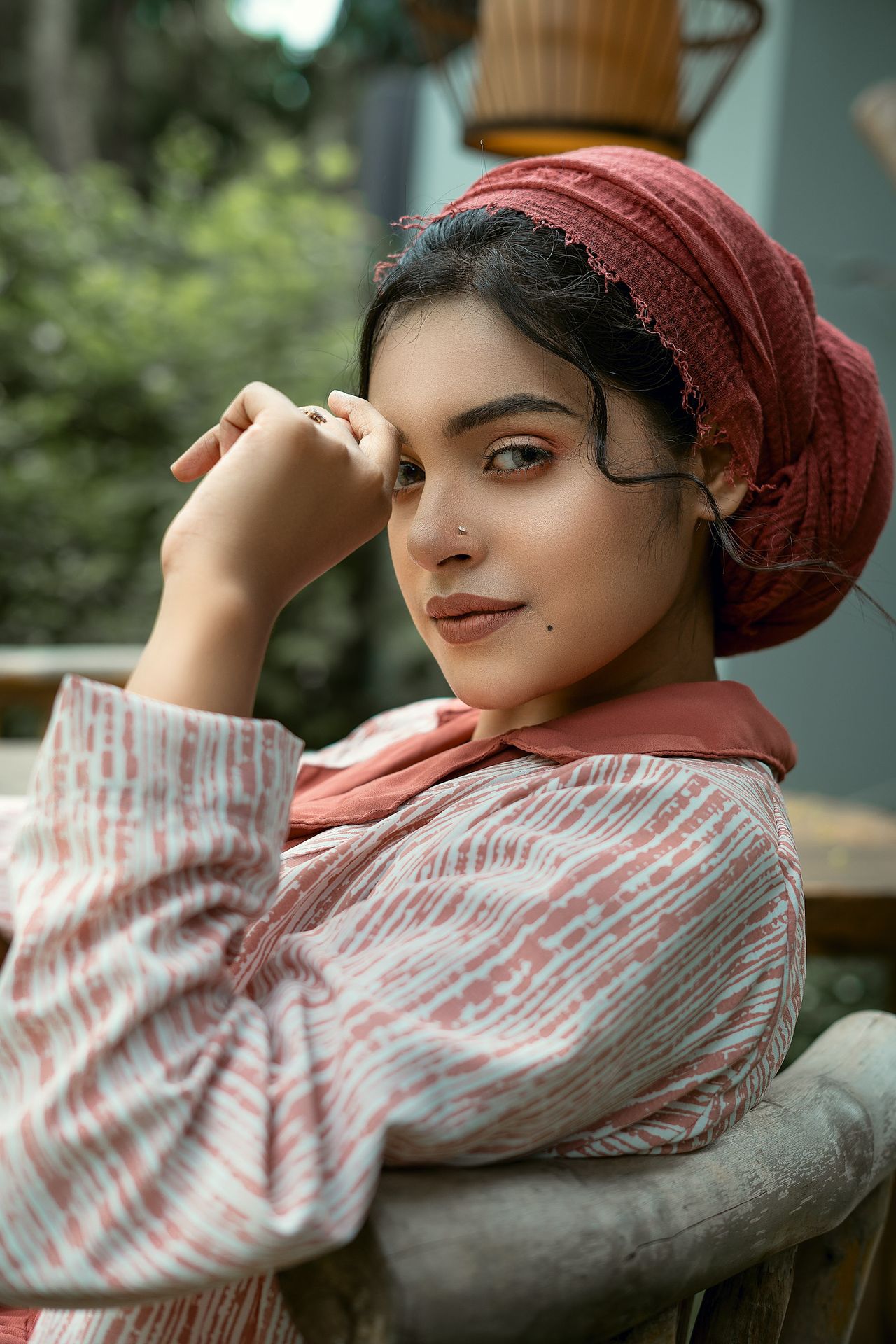 woman in red and white stripe long sleeve shirt